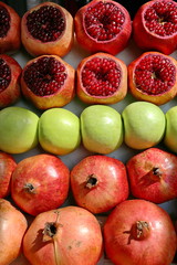 vitamin fruit fresh bomb, pomegranate, orange, ginger, plum, kiwi, lemon, pear, grapes
