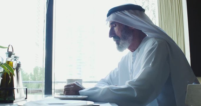Business men in Dubai talking about future business plans