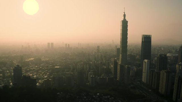 4k Aerial drone footage - Skyline of the city of Taipei, Taiwan at sunset.  