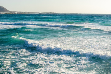 Fototapeta na wymiar Waves on the beach of Falasarna, Greece, Crete