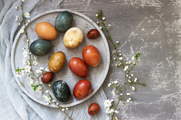 Easter eggs dyed with natural dyes, cabbage, chamomile, hibiscus and onion peel.