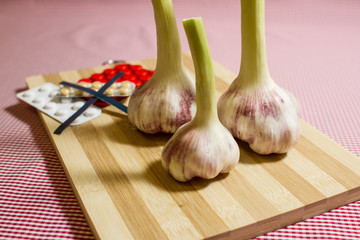 fresh garlic and medical pills, medicine, for treatment