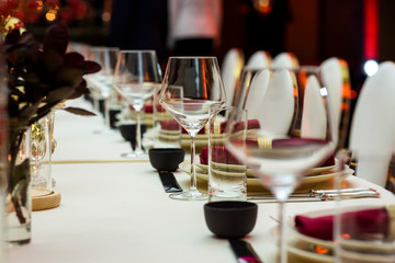 glass glasses standing in a row on a served table