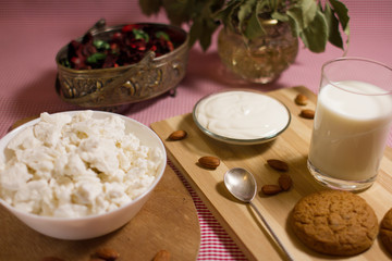 healthy breakfast with cottage cheese, milk, oatmeal cookies