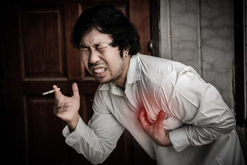 Asian Stress man smoking,Thailand people,No tobacco day concept,DIe from smoke smoking cigarette