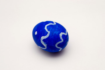 blue Easter egg on white background