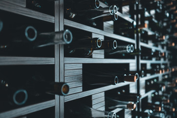 wall with red and white wine bottles modern decoration;