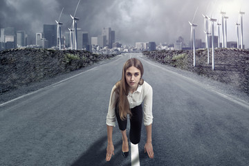 A businesswoman is ready to run. Motivation concept