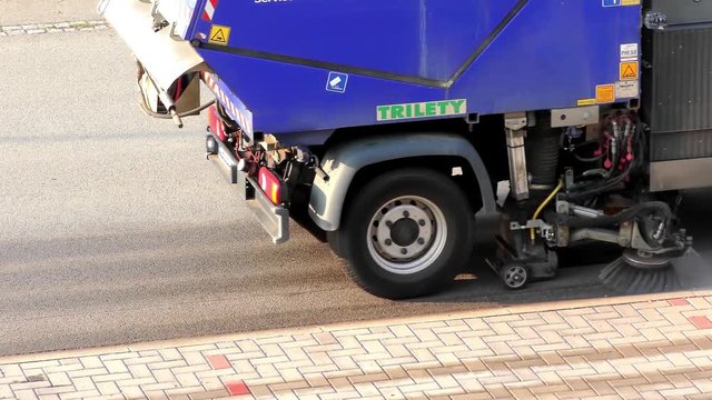 Spring Cleaning In the City  - Road Workers Clean the Street