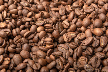 Roasted coffee beans. Composition of coffee beans, coffee beans background. Copy space for text.