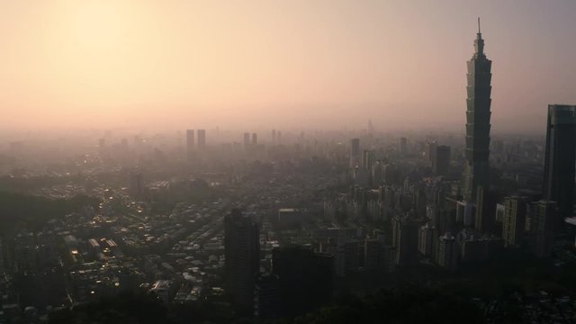 4k Aerial drone footage - Skyline of the city of Taipei, Taiwan at sunset.  