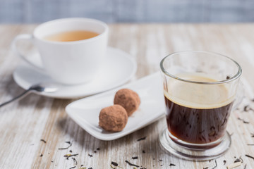 Coffee, tea, and two coconut sweet
