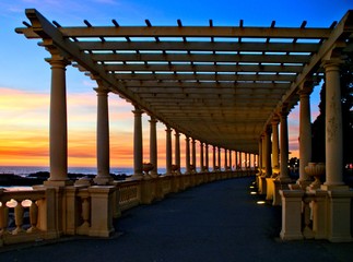 Coastal way sunset with Pergola at Foz do Douro, Oporto, Portugal