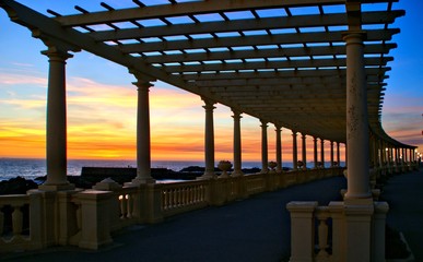 Coastal way sunset with Pergola at Foz do Douro, Oporto, Portugal