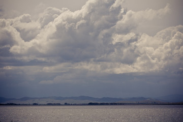 Storm clouds over the lake in the vicinity of the city of Magnitogorsk