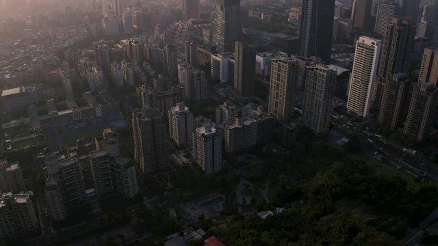 4k Aerial drone footage - Skyline of the city of Taipei, Taiwan at sunset.  