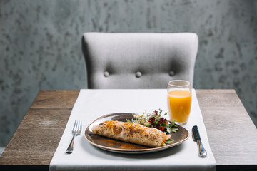 Tasty kebab with food in restaurant