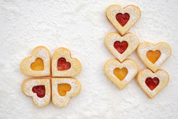  Homemade linzer cookies filled with strawberry and apricot jam
