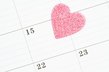 Monthly calendar with a pink heart