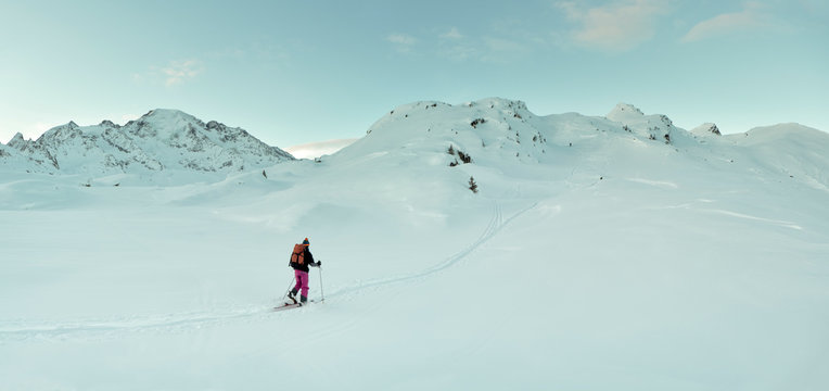 Switzerland, Bagnes, Cabane Marcel Brunet, Mont Rogneux, woman ski touring in the mountains