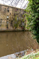 Old mill by a canal.