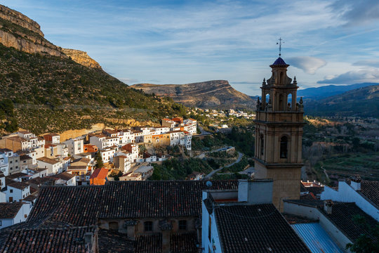 Colorful sunset over the rustic medieval town and Moorish castle of Chulilla, Spain.