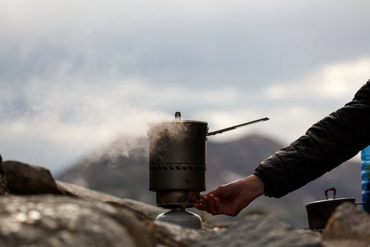 A boiling MSR Reactor backpacking stove.