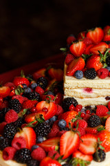 Photo of honey cake with berries close-up