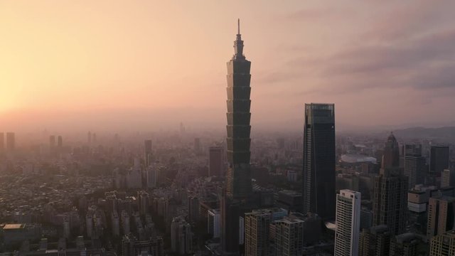 4k Aerial drone footage - Skyline of the city of Taipei, Taiwan at sunset.  