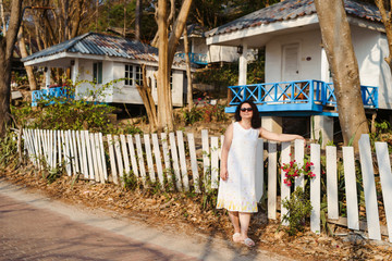 Attractive and happy middle aged woman travelling in Thailand
