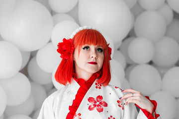 girl in kimano on the background of balls