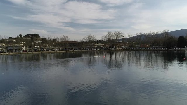 4K drone footage of rowing boat training on the pond of Banyoles, a small city of Catalonia