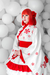 girl in kimano on the background of balls