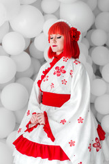 girl in kimano on the background of balls