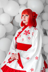 Obraz premium girl in kimano on the background of balls