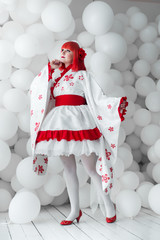 girl in kimano on the background of balls