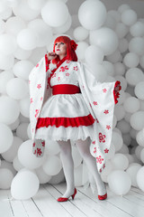 girl in kimano on the background of balls