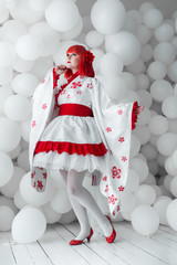 girl in kimano on the background of balls
