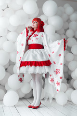 girl in kimano on the background of balls