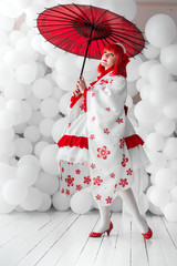 girl in kimano on the background of balls