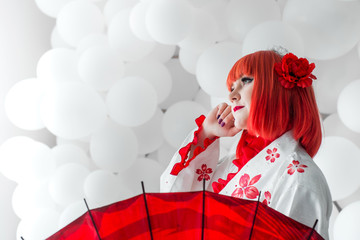 girl in kimano on the background of balls