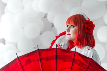 girl in kimano on the background of balls