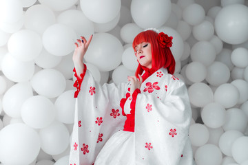 girl in kimano on the background of balls