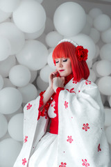 girl in kimano on the background of balls