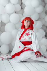girl in kimano on the background of balls