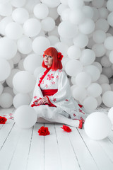 girl in kimano on the background of balls
