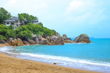 blue lagoon among the stones,house on top of the hill