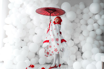 girl in kimano on the background of balls