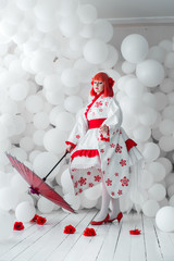 girl in kimano on the background of balls