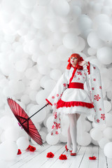 girl in kimano on the background of balls